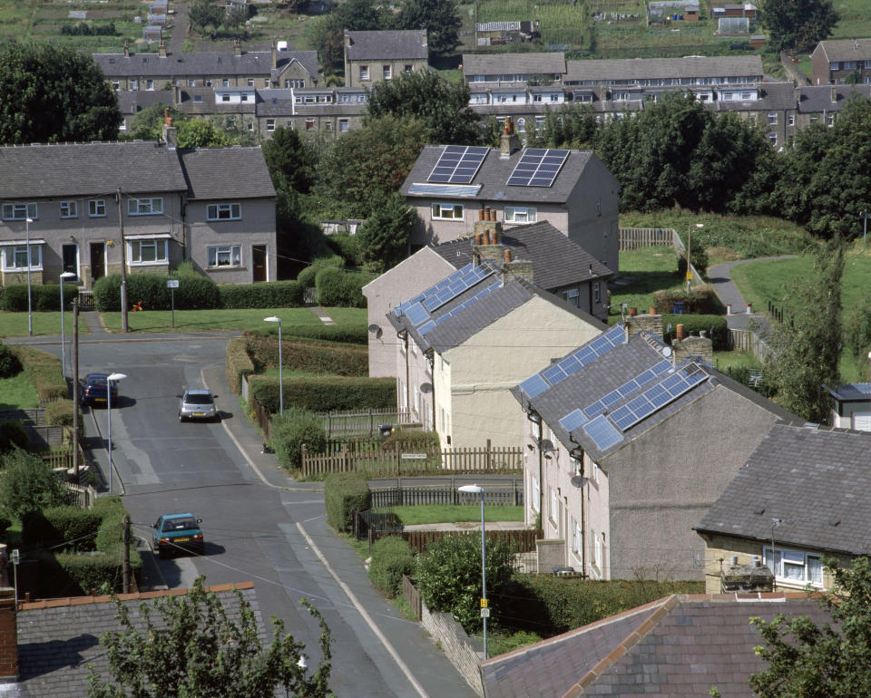 Photovoltaic cells for generating electricity on house roofs, Primrose Hill Solar Village, Huddersfield UK. (Photo by Photofusion/Construction Photography/Avalon/Getty Images)