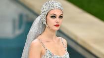 Forget wedding dresses! Chanel's take on bridal includes an embellished cut-out swimsuit complete with sequined veil and cap.