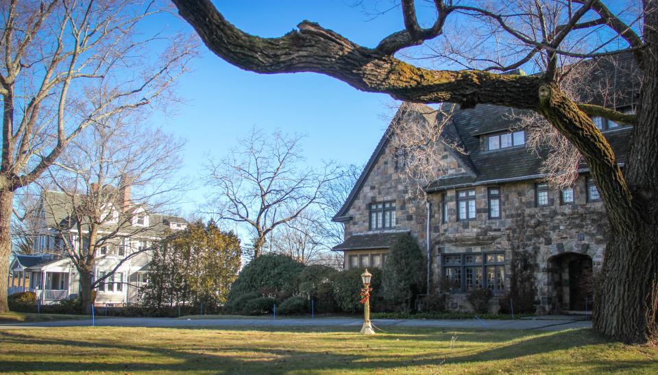 The Ninth Street Day Nursery, left, sits next door to the mansion at 503 Highland Ave. in Fall River.