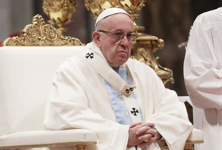 Pope Francis leads a mass to mark the World Day of Peace in Saint Peter's Basilica at the Vatican, January 1, 2019. REUTERS/Tony Gentile