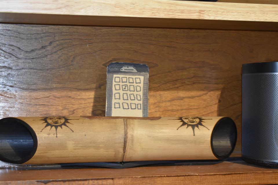 A piece of bamboo fashioned into a speaker of sorts, $40 at Juniper Gallery, that amplifies music from a cell phone placed inside.