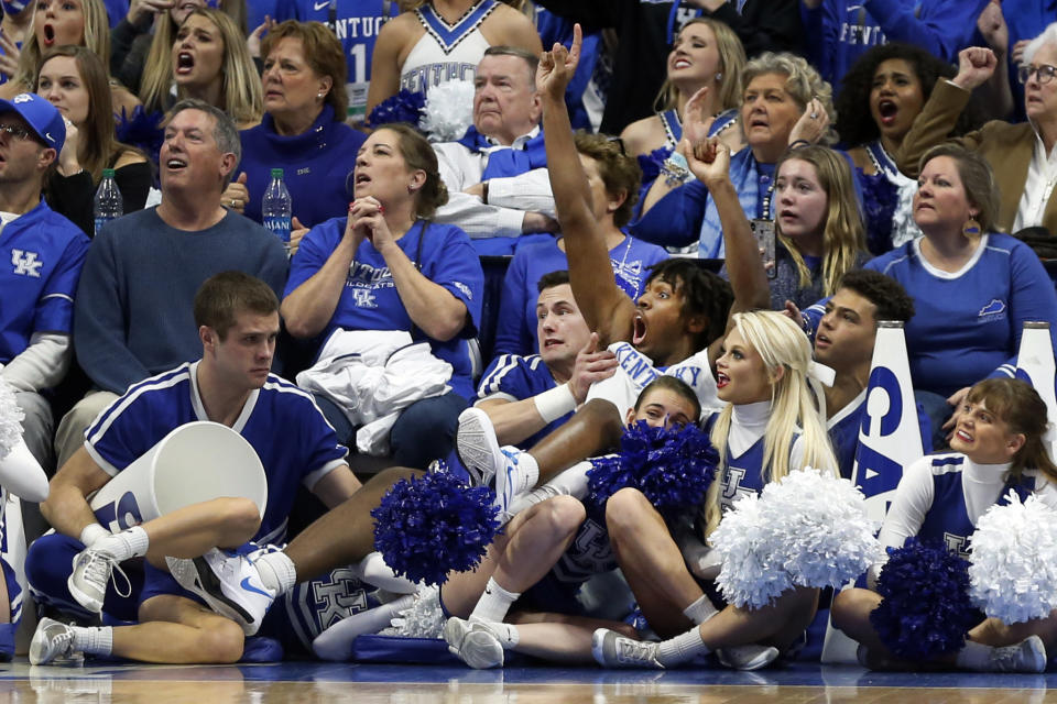 Kentucky's Tyrese Maxey reacts to his last-second shot in regulation of the team's NCAA college basketball game against Louisville in Lexington, Ky., Saturday, Dec. 28, 2019. The shot rimmed out, but Kentucky went on to win 78-70 in overtime. (AP Photo/James Crisp)