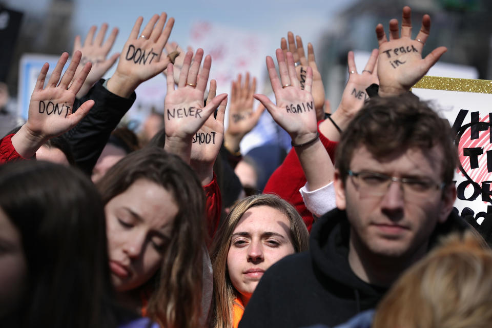 <p>Protesters gather for the March for Our Lives rally along Pennsylvania Avenue in Washington, D.C. (Photo: Chip Somodevilla/Getty Images) </p>