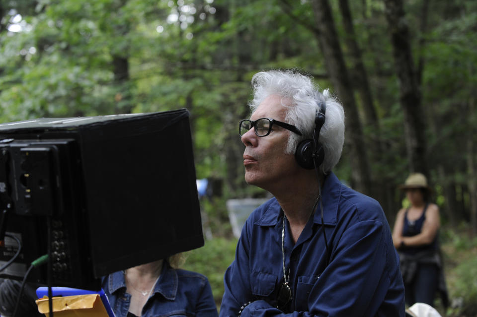 In this undated photo provided by Focus Features, writer/director Jim Jarmusch works on the set of his latest film "The Dead Don't Die." (Abbot Genser / Image Eleven Productions, Inc./Focus Features via AP)