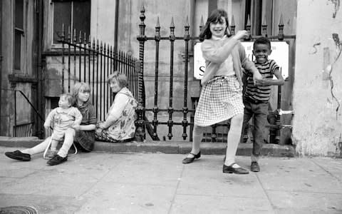 A group of children playing in the street, Powis Square, Notting Hill, London 1964 - Credit: UniversalImagesGroup 