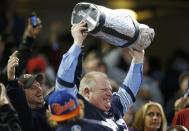 Toronto Mayor Rob Ford watches the CFL eastern final football game between the Toronto Argonauts and the Hamilton Tiger Cats in Toronto, November 17, 2013. REUTERS/Mark Blinch (CANADA - Tags: SPORT FOOTBALL)