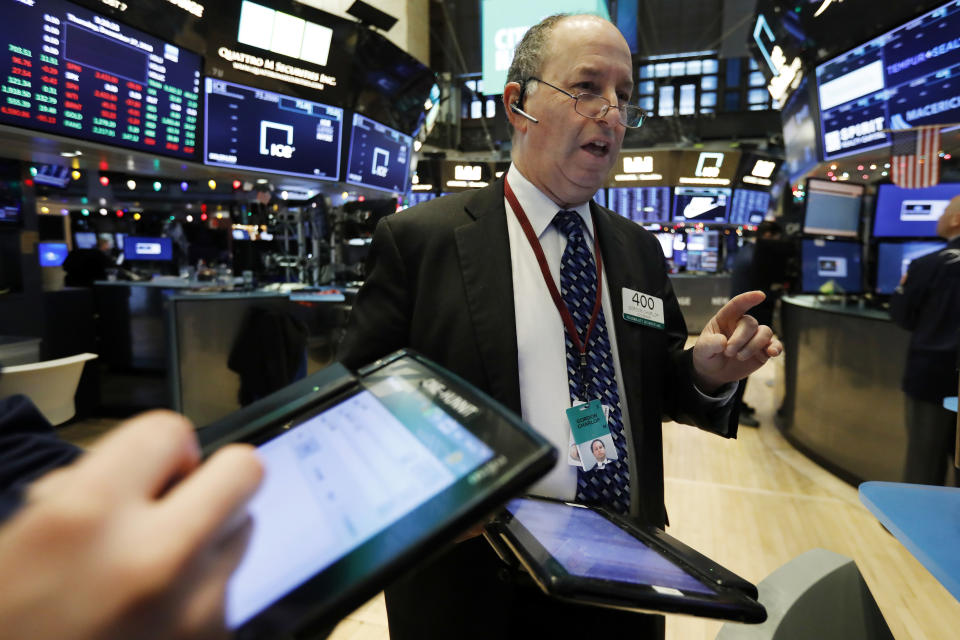 Trader Gordon Charlop works on the floor of the New York Stock Exchange, Thursday, Dec. 27, 2018. Wall Street's wild Christmas week goes on, with the Dow Jones Industrial Average slumping 300 points at the open Thursday, a day after notching its biggest-ever point gain. (AP Photo/Richard Drew)