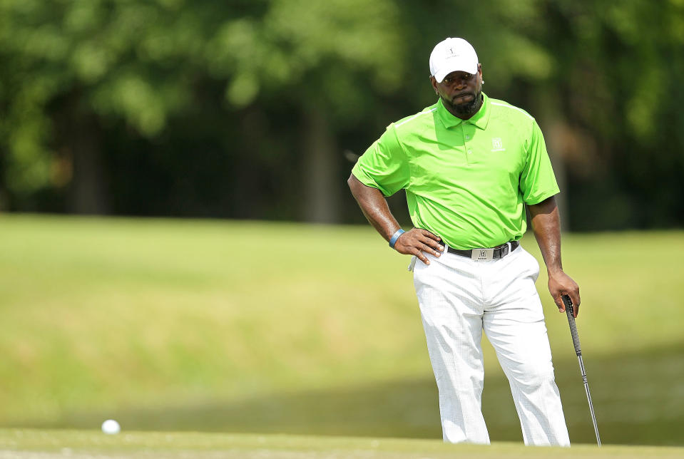 Former NFL player Emmitt Smith putts on the 8th hole during the second round of the Outback Steakhouse Pro-Am at the TPC of Tampa on April 16, 2011 in Lutz, Florida. (Photo by Mike Ehrmann/Getty Images)