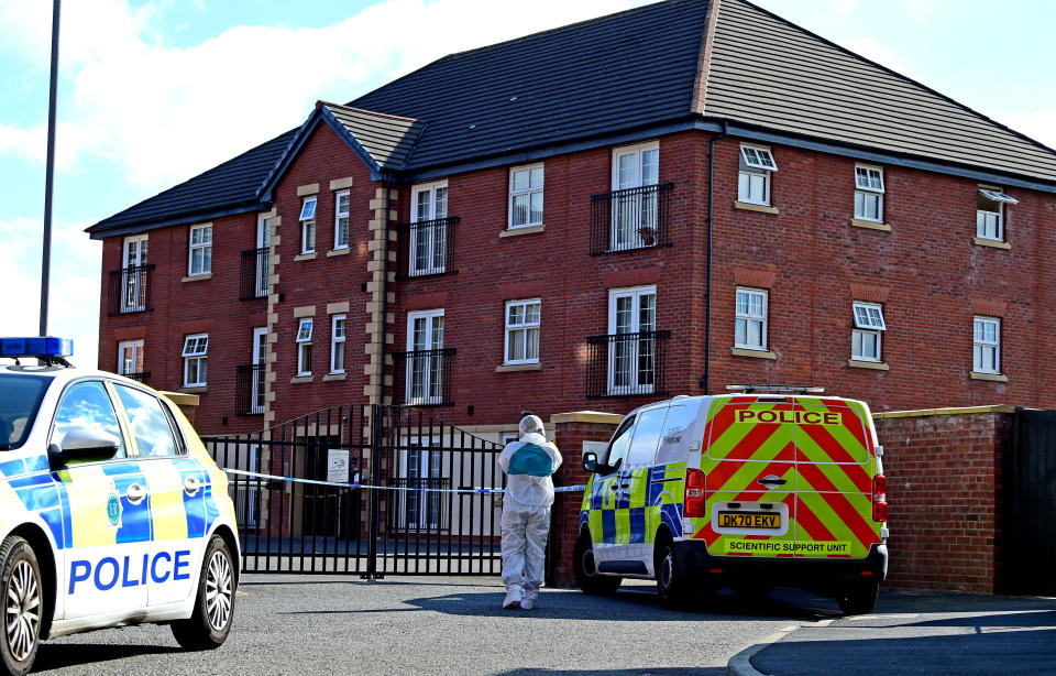 Police at the cordoned-off apartments on Piele Road, Haydock, in Merseyside. (Reach)                                                                                                                                                                                                                                                                                                                                                                                                                                                                                                                                                                                                                                                                                                                                                                                                                                                                                                                                                                                                                                                                                                                                                                                                                                                                                                                                                                                                                                                                                                                                                                                                                                                                                                                                              