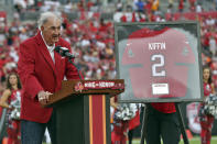 Former Tampa Bay Buccaneers defensive coordinator Monte Kiffin speaks to the crowd after being inducted into the Buccaneer's Ring of Honor during halftime of an NFL football game against the Atlanta Falcons Sunday, Sept. 19, 2021, in Tampa, Fla. (AP Photo/Mark LoMoglio)