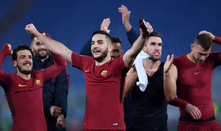 Soccer Football - Champions League - Roma vs Qarabag - Stadio Olimpico, Rome, Italy - December 5, 2017 Roma's Konstantinos Manolas celebrates after the match REUTERS/Alberto Lingria