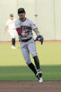 Arizona Diamondbacks second baseman Josh Rojas throws to first base to get San Francisco Giants' Pablo Sandoval out during the third inning of a baseball game on Monday, Sept. 7, 2020, in San Francisco. (AP Photo/Tony Avelar)