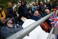 <p>Mourners faced a test of endurance to secure the best viewing positions in central London to see the procession. (Getty)</p> 