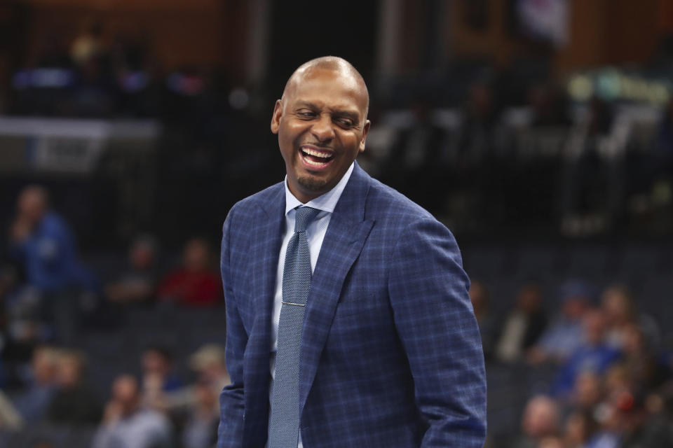 Memphis head coach Penny Hardaway laughs from the bench during the second half of an NCAA college basketball game against Illinois-Chicago, Friday, Nov. 8, 2019, in Memphis, Tenn. (AP Photo/Karen Pulfer Focht)