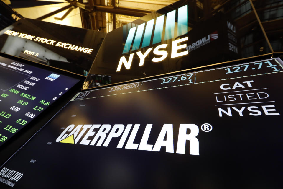 FILE - In this Jan. 28, 2019, file photo the logo for Caterpillar appears above a trading post on the floor of the New York Stock Exchange. A knee-jerk reaction in the market is to sell big industrial companies whenever trade worries rise. The temptation makes sense given how global the companies are, but it may be misguided, said Stephen Volkmann, an equity analyst at Jefferies who covers machinery and industrial companies. (AP Photo/Richard Drew, File)