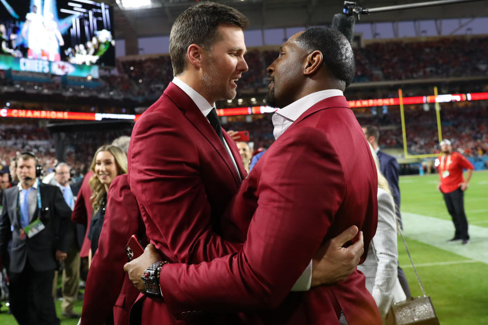 Tom Brady of the New England Patriots talks with NFL Hall of Famer Ray Lewis of the Baltimore Ravens prior to Super Bowl LIV between the San Francisco 49ers and the Kansas City Chiefs at Hard Rock Stadium on February 02, 2020 in Miami, Florida. (Photo by Maddie Meyer/Getty Images)