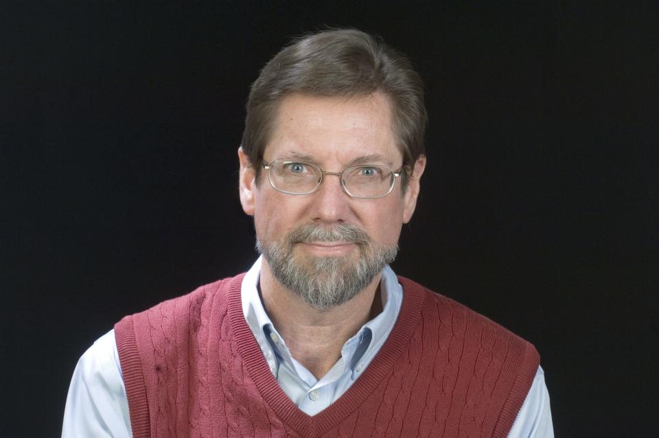 Roger McBain in his 2010 staff photograph for the Courier & Press.