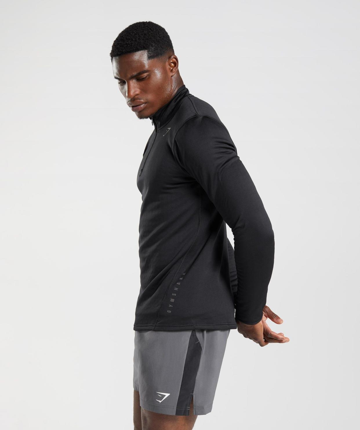 <p><a href="https://go.redirectingat.com?id=74968X1596630&url=https%3A%2F%2Fwww.gymshark.com%2Fproducts%2Fgymshark-sport-1-4-zip-black-aw22&sref=https%3A%2F%2F" rel="nofollow noopener" target="_blank" data-ylk="slk:Shop Now;elm:context_link;itc:0;sec:content-canvas" class="link rapid-noclick-resp">Shop Now</a></p><p>Sport 1/4 Zip</p><p>gymshark.com</p><p>$28.80</p>