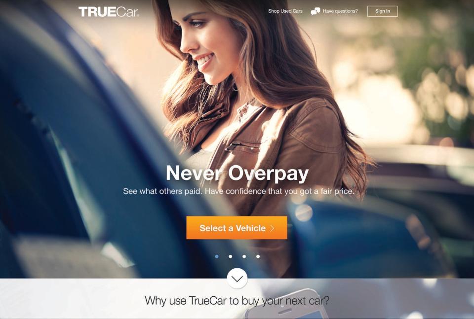 Smiling person in front of a car, with TrueCar promotional text superimposed.