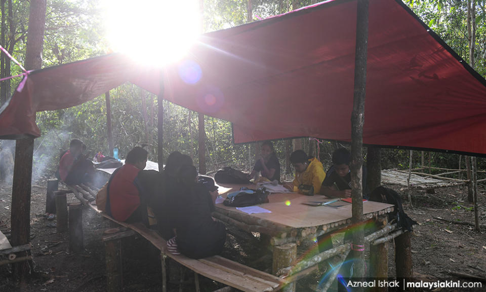 Up to 20 children and youths from Kampung Orang Asli Kemidak make use of the hut for their studies.