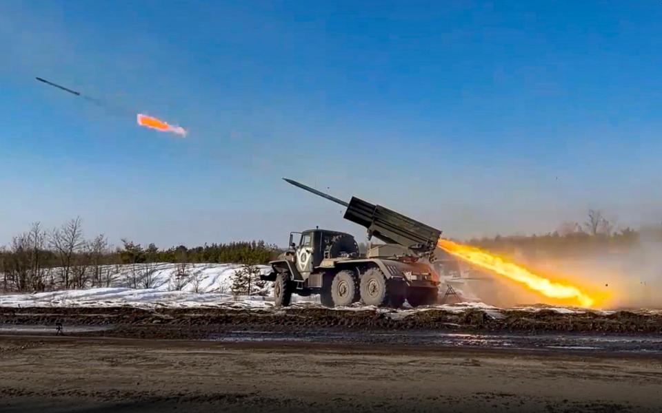 Russian military's Grad multiple rocket launcher firing rockets at Ukrainian troops at an undisclosed location - Rusian Defense Ministry Press Service