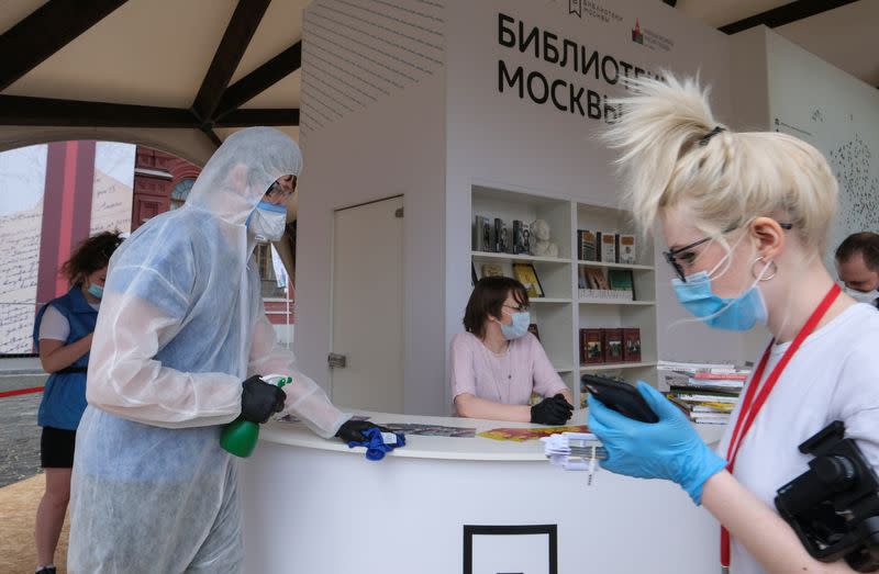 People attend the annual Red Square Book Fair in central Moscow