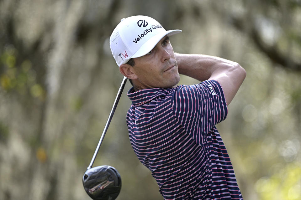 Billy Horschel watches his tee shot on the ninth hole during the final round of the Workday Championship golf tournament Sunday, Feb. 28, 2021, in Bradenton, Fla. (AP Photo/Phelan M. Ebenhack)