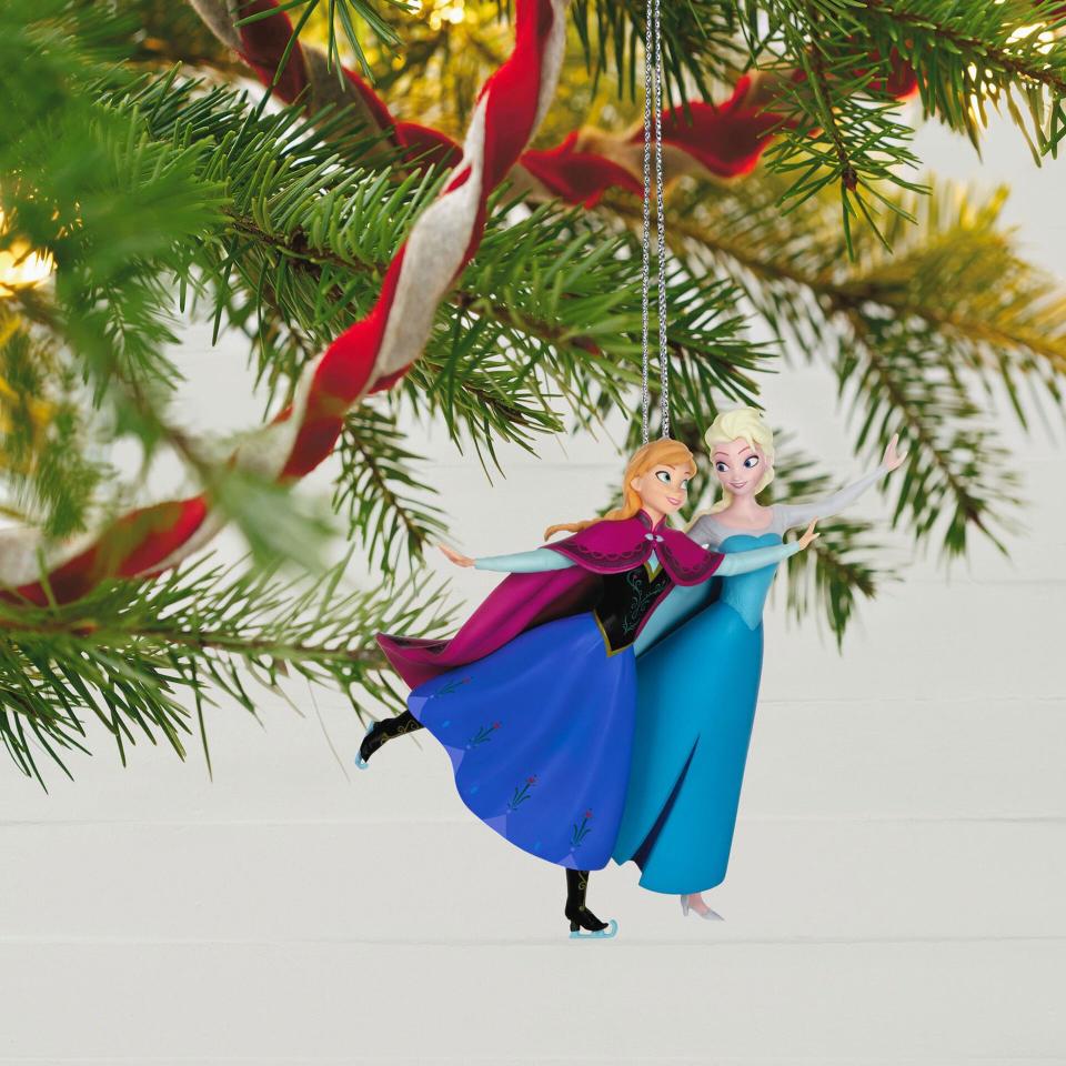 <p><a href="https://www.hallmark.com/ornaments/keepsake-ornaments/disney-frozen-10th-anniversary-two-sisters-one-heart-ornament-2799QXD6599.html?gclid=Cj0KCQjw0bunBhD9ARIsAAZl0E02dTVhuwswPF9puFrxdfLfrTyn9zNmMo8JBAYlnDMGYjAFIM7UhPkaAoS_EALw_wcB&ef_id=Cj0KCQjw0bunBhD9ARIsAAZl0E02dTVhuwswPF9puFrxdfLfrTyn9zNmMo8JBAYlnDMGYjAFIM7UhPkaAoS_EALw_wcB%3AG%3As&s_kwcid=AL%215392%213%21%21%21%21x%21%21%2118742961912%21&mc=t_s_hr_Google+Adwords_PLA+-+RoAS+-+Smart+Shopping+KeepsakeOrnaments_+-+G+-+OCE_Smart+Shopping+KeepsakeOrnaments_" rel="nofollow noopener" target="_blank" data-ylk="slk:Shop Now;elm:context_link;itc:0;sec:content-canvas" class="link ">Shop Now</a></p><p>Disney 'Frozen' Christmas Ornament</p><p>hallmark.com</p><p>$27.99</p><span class="copyright">Hallmark</span>