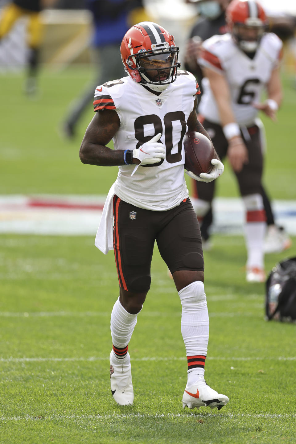 Cleveland Browns wide receiver Jarvis Landry (80) carries the ball during warm-ups prior to an NFL game against the Pittsburgh Steelers, Sunday, Oct. 18, 2020, in Pittsburgh. The Steelers defeated the Browns 38-7. (Margaret Bowles via AP)