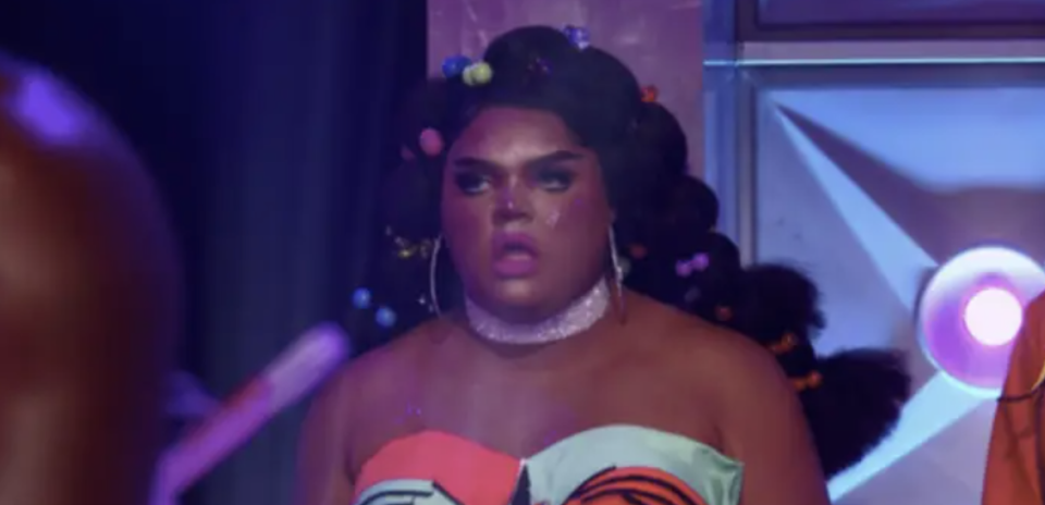 A drag queen from "RuPaul's Drag Race" looking shocked
