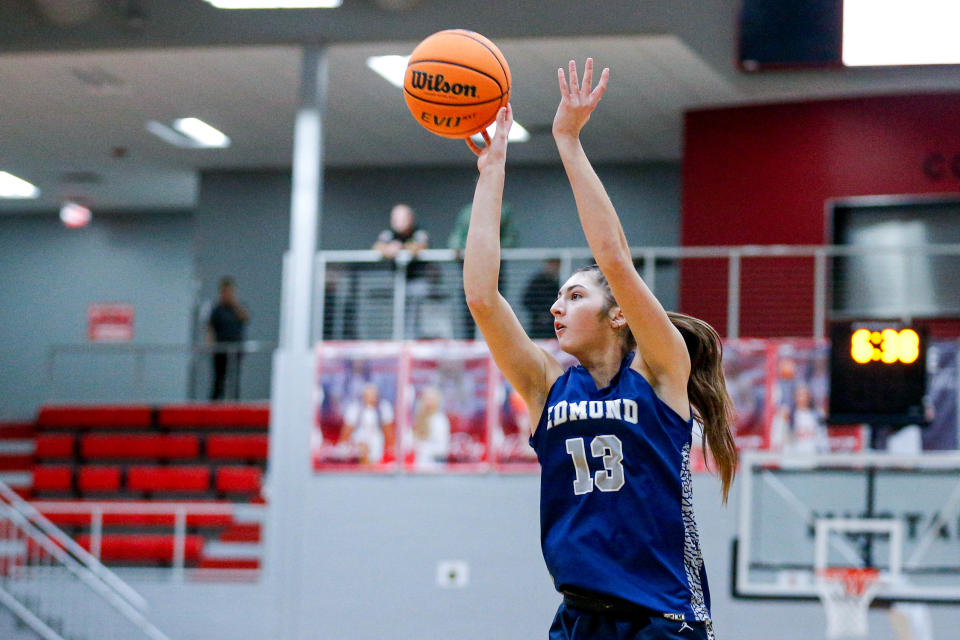 Edmond North’s Allison Heathcock (13) shoots a 3-pointer during the Mustang Holiday Classic final round of the Girls Basketball tournament between Edmond North and Mustang in Mustang Okla., on Saturday, Dec. 30, 2023.