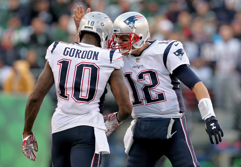 EAST RUTHERFORD, NJ. - NOVEMBER 25: Josh Gordon of the New England Patriots is congratulated by Tom Brady after they connected for a 17 yard first down catch during the 4th quarter of the game at MetLife Stadium on November 25, 2018 in East Rutherford, New Jersey.  (Staff Photo By Nancy Lane/MediaNews Group/Boston Herald via Getty Images)