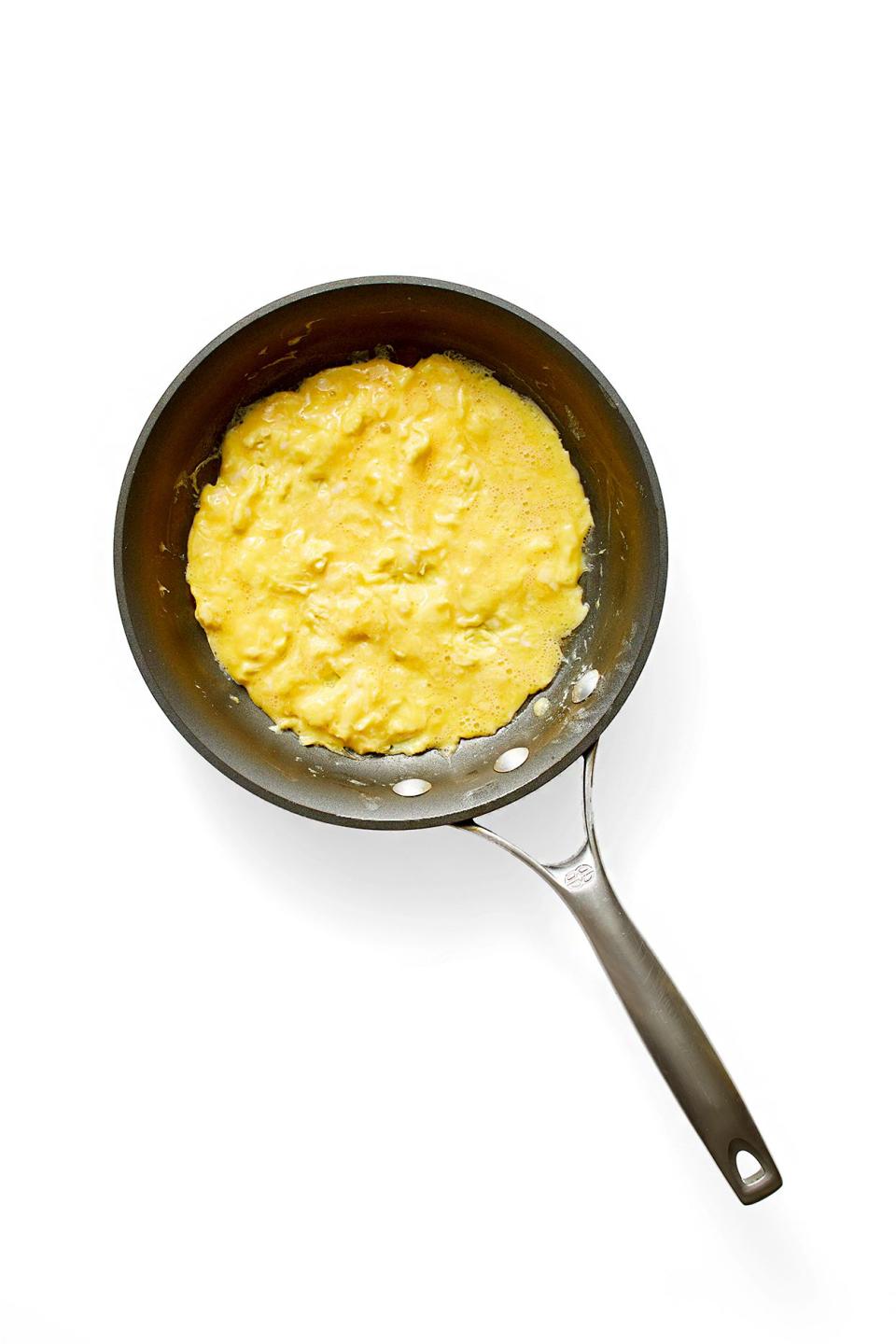 Eggs in pan for omelet