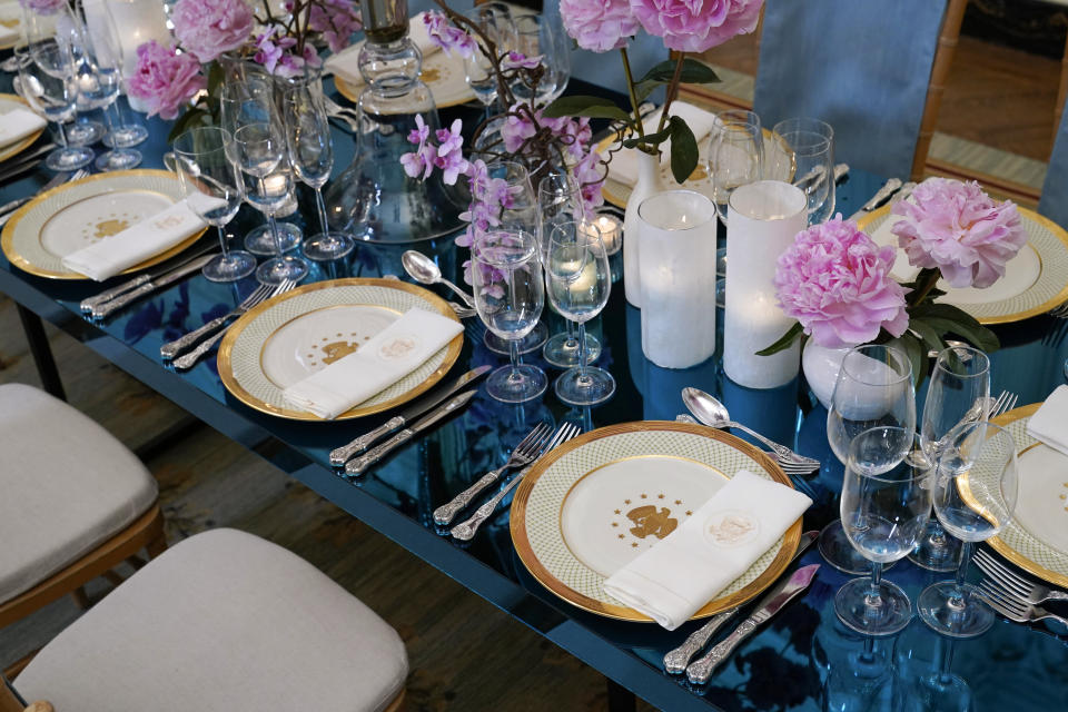 Place settings are displayed during a preview, Monday, April 24, 2023, in advance of Wednesday's State Dinner with South Korea's President Yoon Suk Yeol at the White House in Washington. (AP Photo/Susan Walsh)