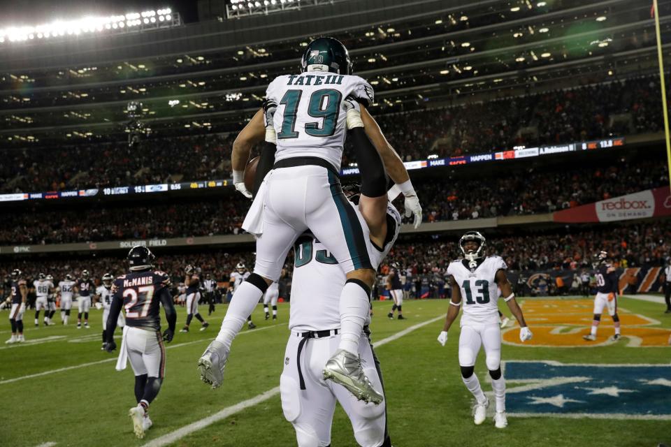 Philadelphia Eagles wide receiver Golden Tate (19) celebrates his touchdown reception with offensive tackle Lane Johnson (65) during the second half of an NFL wild-card playoff football game against the Chicago Bears Sunday, Jan. 6, 2019, in Chicago. (AP Photo/Nam Y. Huh)