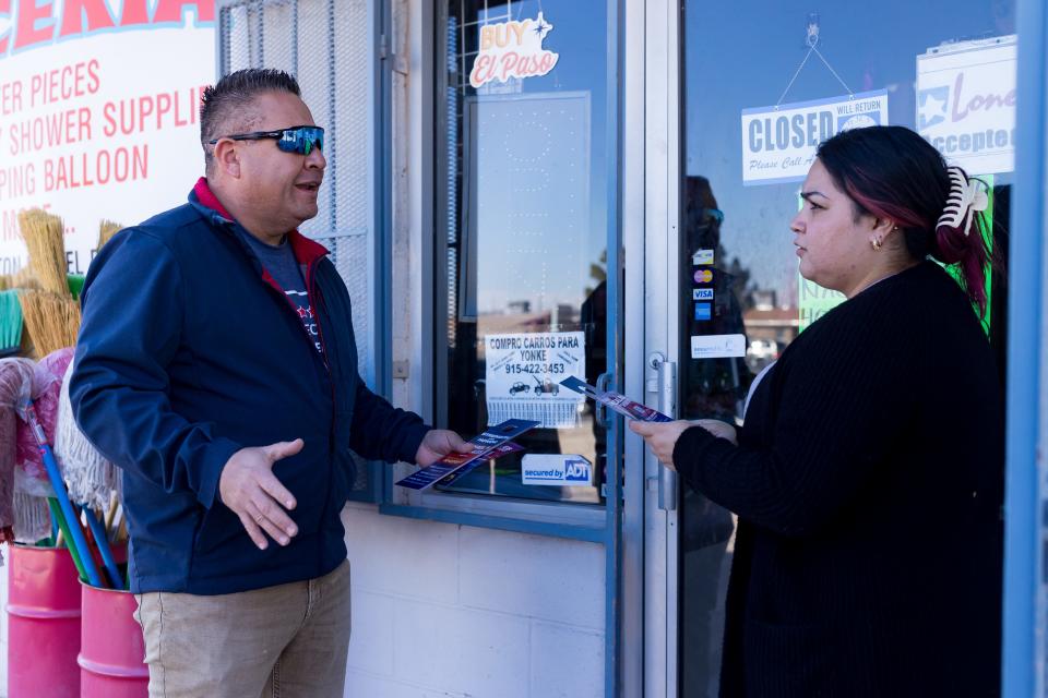 Michael P. Gonzales, a candidate for El Paso County sheriff, stopped to talk to an employee at Dulceria La Pachanga in the Sparks area of eastern El Paso County as he blockwalked with his family on Saturday, Feb. 17.