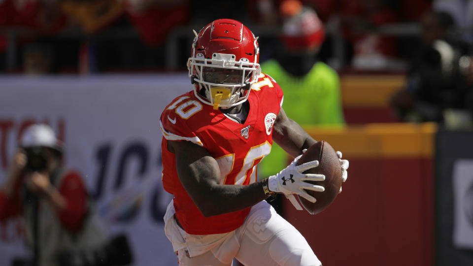 Kansas City Chiefs wide receiver Tyreek Hill (10) celebrates a touchdown during the first half of an NFL football game against the Houston Texans in Kansas City, Mo., Sunday, Oct. 13, 2019. (AP Photo/Colin E. Braley)