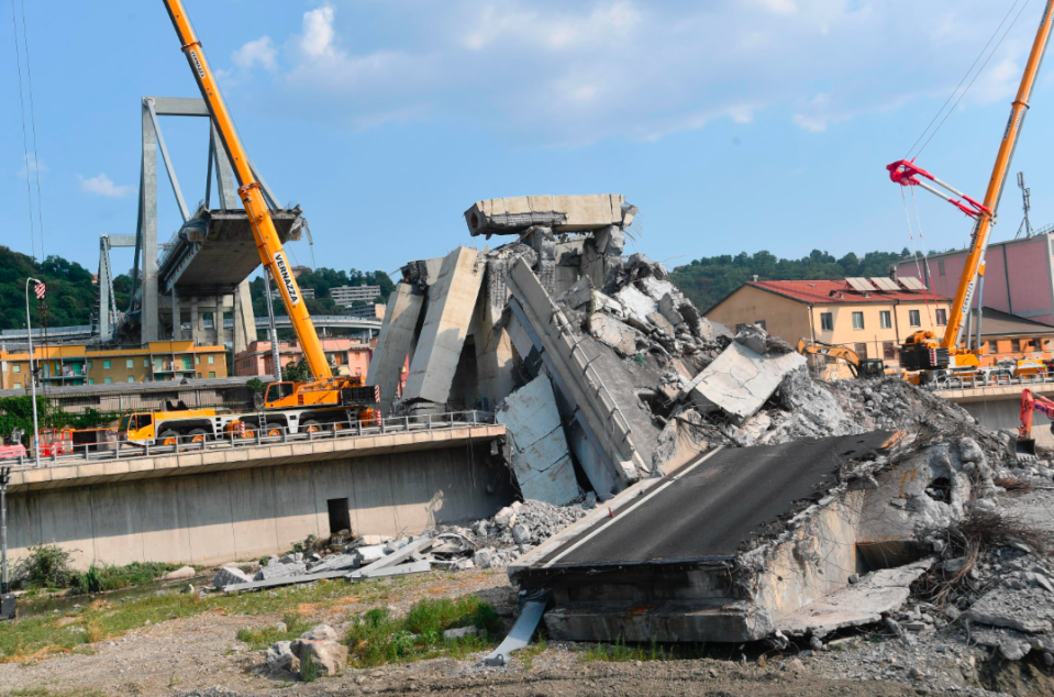 <em>At least 43 people were killed when the bridge collapsed during a storm (AP)</em>