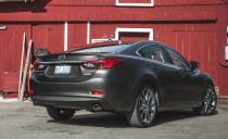 <p>For 2016, <a rel="nofollow noopener" href="http://www.caranddriver.com/news/2016-mazda-6-sedan-official-photos-and-info-news" target="_blank" data-ylk="slk:Mazda updated the 6;elm:context_link;itc:0;sec:content-canvas" class="link ">Mazda updated the 6</a> with an improved interior that finally matches the exterior’s wow factor, but the sedan’s sharp handling thankfully was left intact.</p>