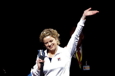FILE PHOTO: Belgium's Kim Clijsters waves as she arrives to play an exhibition tennis match against Venus Williams of the U.S., marking the end of Clijsters' professional career in Antwerp December 12, 2012. REUTERS/Francois Lenoir
