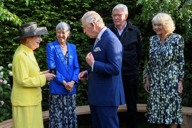 The King and Queen Camilla speak to Janet Fookes (left), Piet Oudolf and Judy Ling Wong after awarding them with the Elizabeth Medal of Honour Award in the Royal Horticultural Society Garden of Royal Reflection and Celebration during a visit to the RHS Chelsea Flower, at the Royal Hospital Chelsea, London 