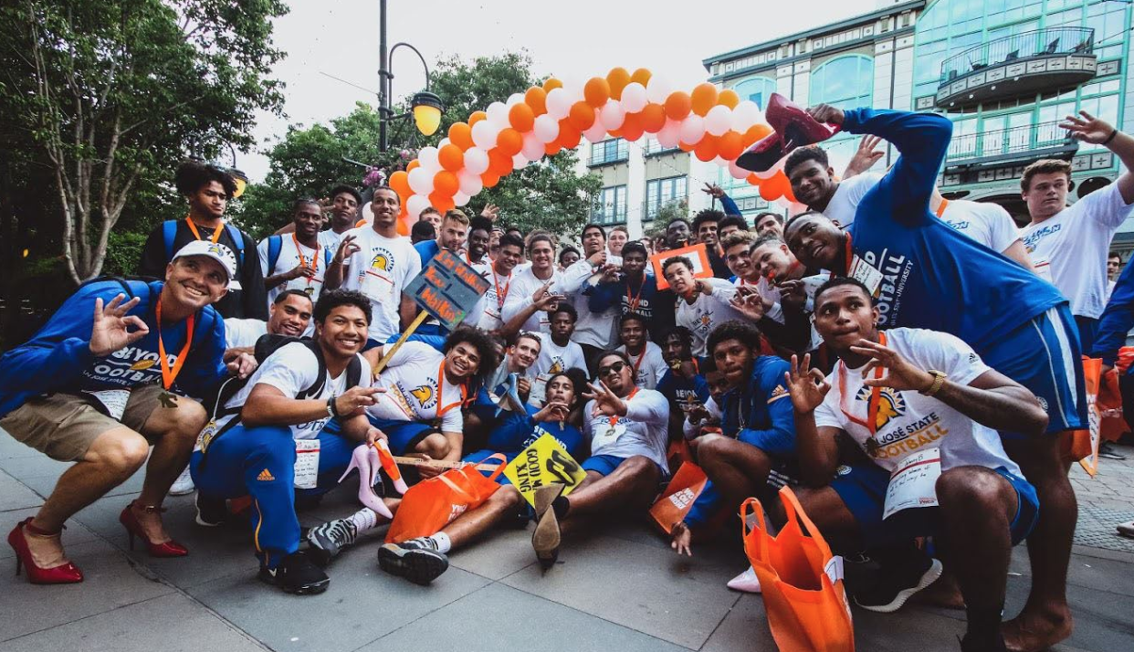 The San Jose State University football team is being praised after video of their participation in the "Walk A Mile In Her Shoes" event goes viral. (Photo: San Jose State University Spartans)