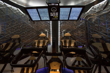 File Photo: The cabin of the Dragon V2 spacecraft is pictured after it was unveiled in Hawthorne, California May 29, 2014. REUTERS/Mario Anzuoni/File Photo