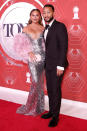 <p>Chrissy Teigen looks pretty in pink (and silver!) on the red carpet with her husband, John Legend, who performed with the cast of <em>Ain't Too Proud the Musical</em>.</p>