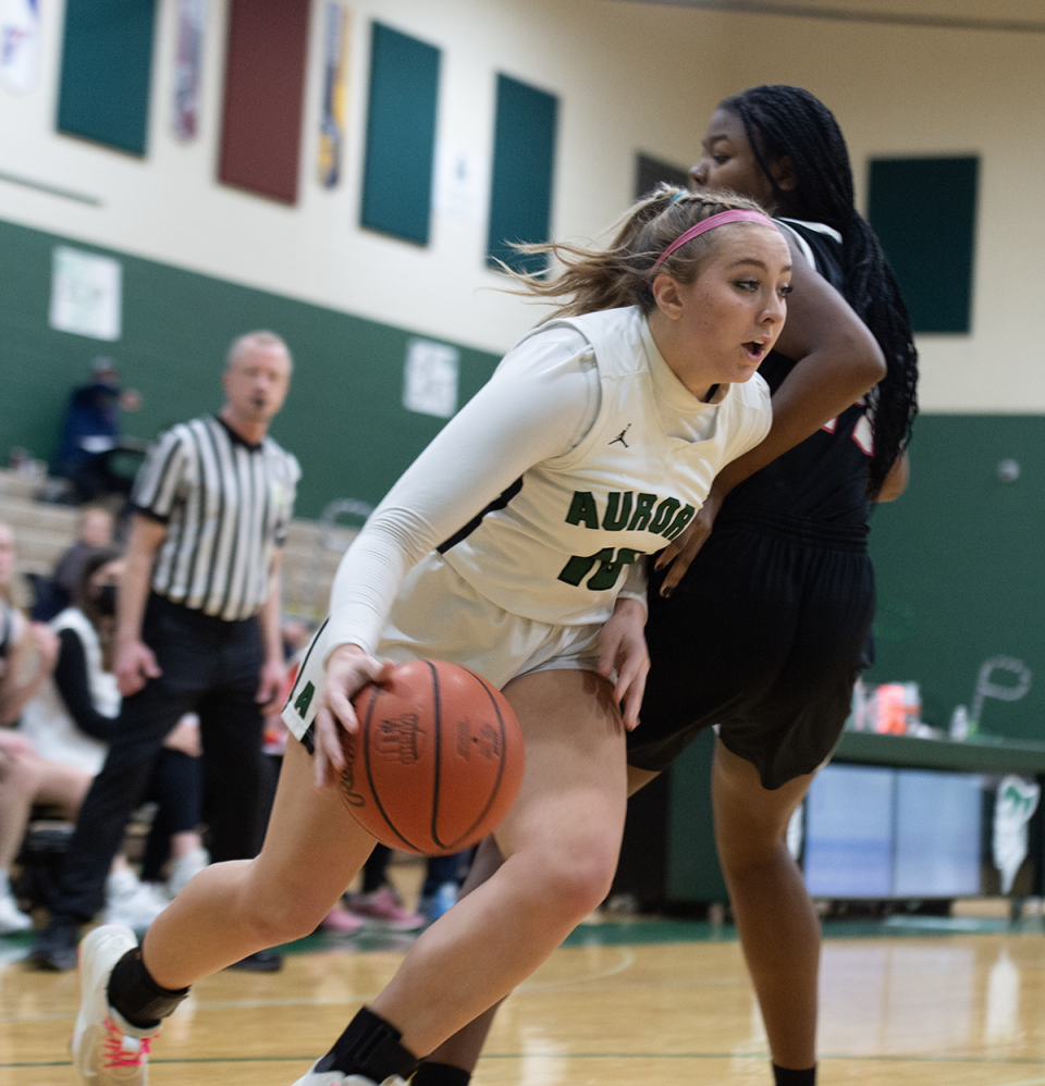 Grace Barbour with possession, Saniya Moxley on defense. Aurora hosted Kent Roosevelt on Saturday, February 4.