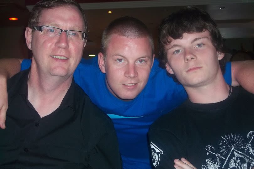 Ryan Myers, centre, with his dad John, left, and brother Michael, right. Photo: Myers family