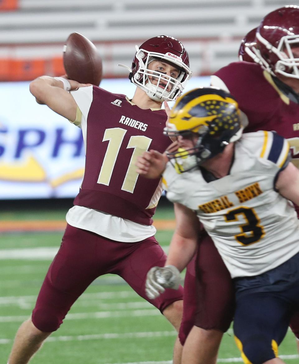 O'Neill quarterback Nick Waugh (11) looks for an open receiver against General Brown during the state Class C football championships at JMA Wireless Dome in Syracuse Dec. 3, 2022. 