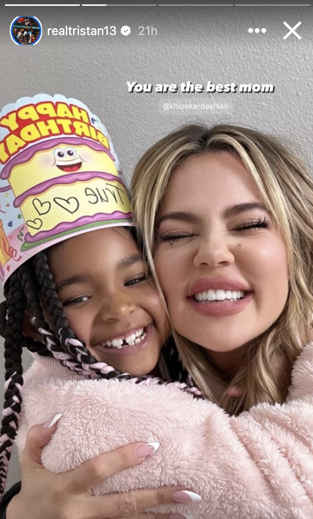 Khloé Kardashian smiles while tightly hugging a young child in a birthday hat with text that says, "Happy Birthday True." Text on image reads, "You are the best mom."