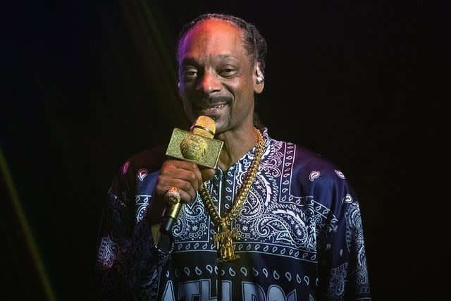 <p>Joseph Okpako/WireImage</p> Snoop Dogg performs in London in March 2023