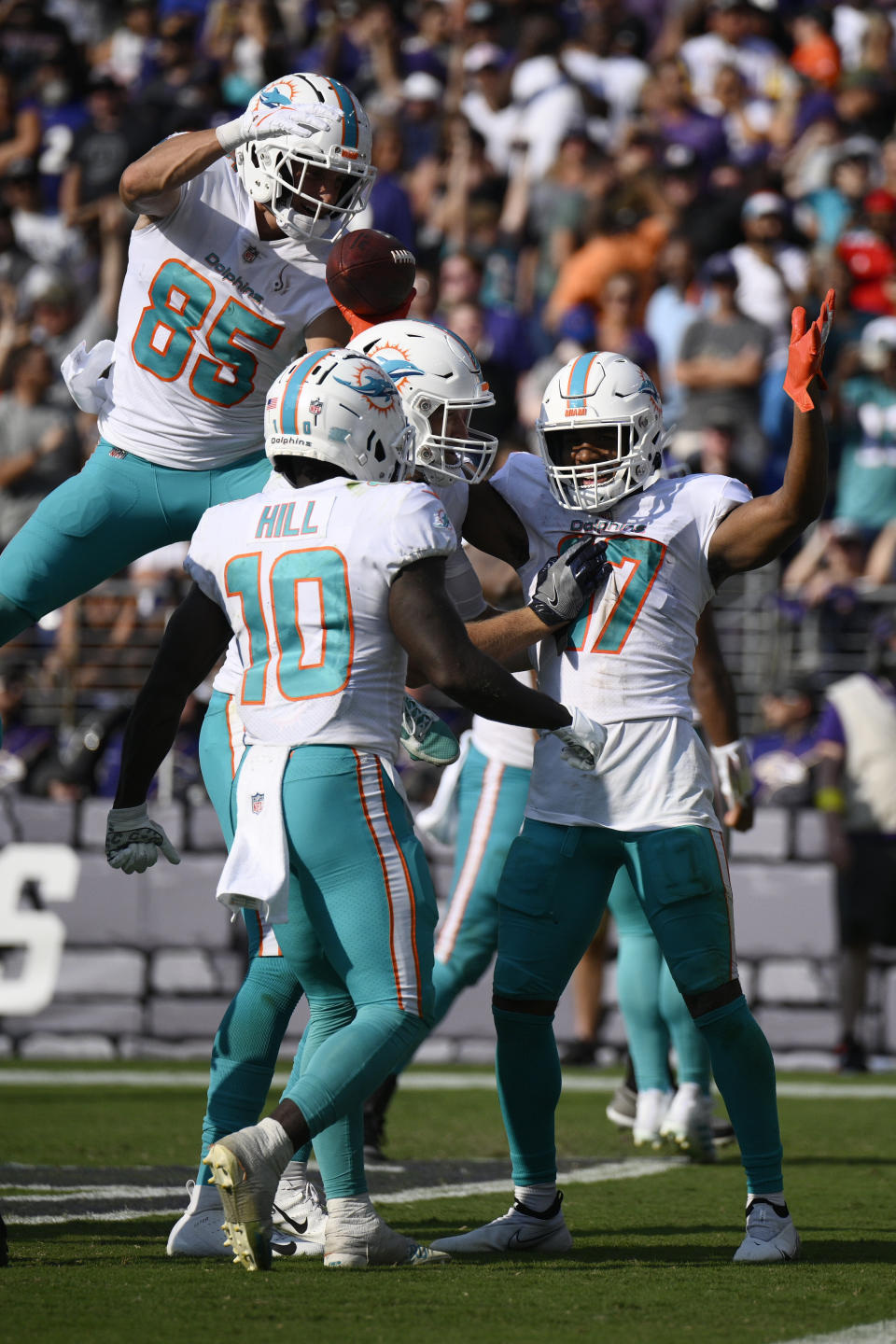 Miami Dolphins wide receiver Jaylen Waddle (17) celebrates after a touchdown during the second half of an NFL football game against the Baltimore Ravens, Sunday, Sept. 18, 2022, in Baltimore. (AP Photo/Nick Wass)